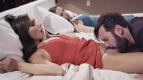 Hubby tonguing youthfull honey's cootchie next to sleeping wifey