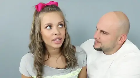 Platinum-Blond teenage with petite orbs chatting to a smoothly-shaven fellow