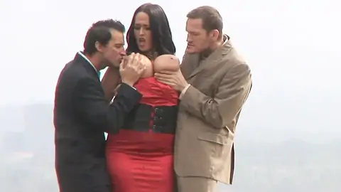 Curvaceous dark-haired with meaty knockers in dominating threesome outdoors