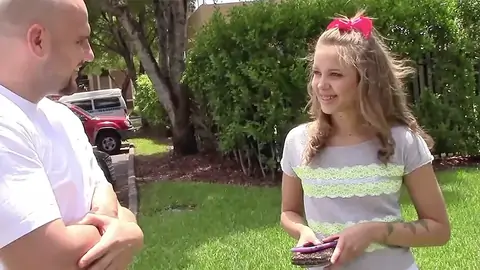 Platinum-blonde nubile with small milk cans talking to a smoothly-shaven dude