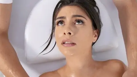 Greased up dark-hued-haired is getting her pussy finger-tickled